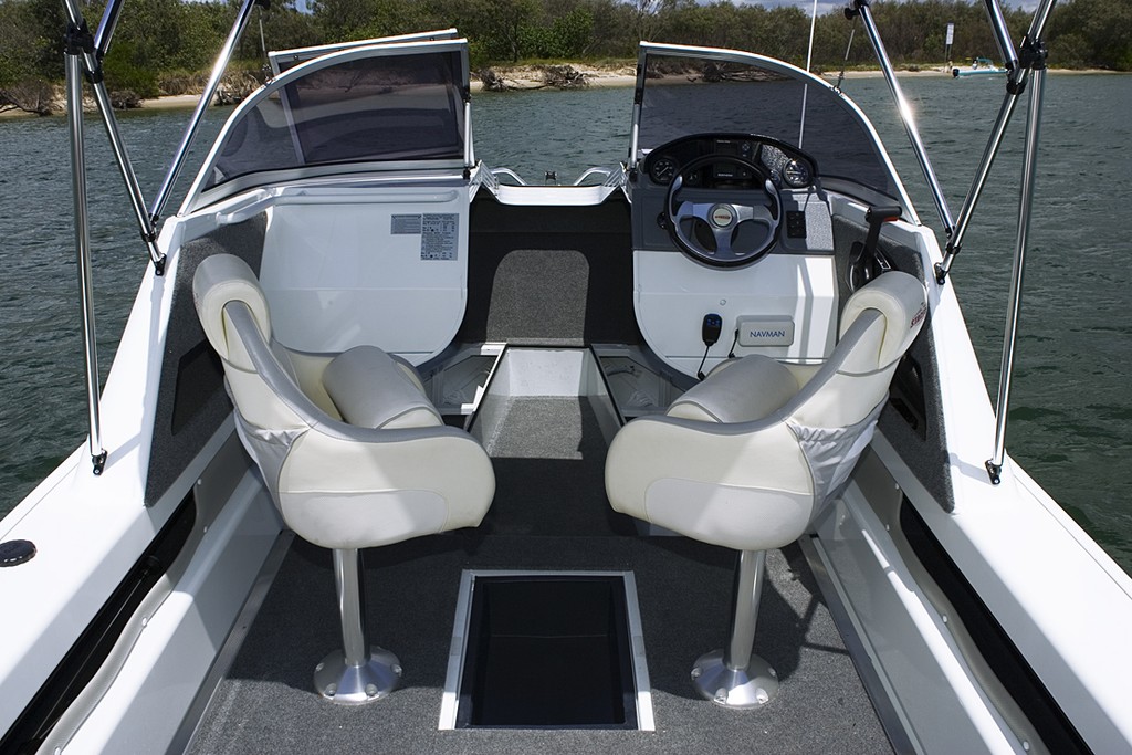 Comfortable seating and a dash designed for electronics © Ebany Draper Telwater